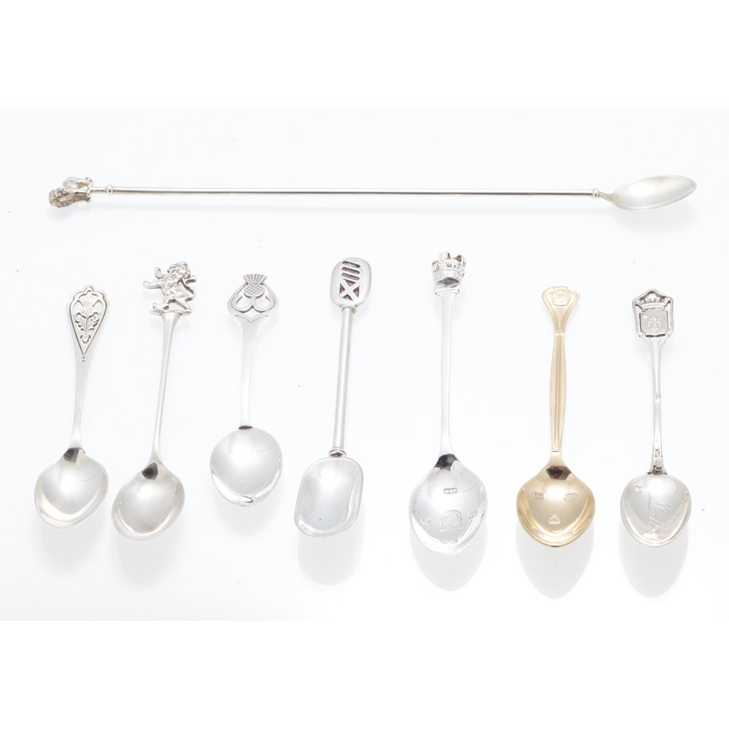 A large collection of modern spoons