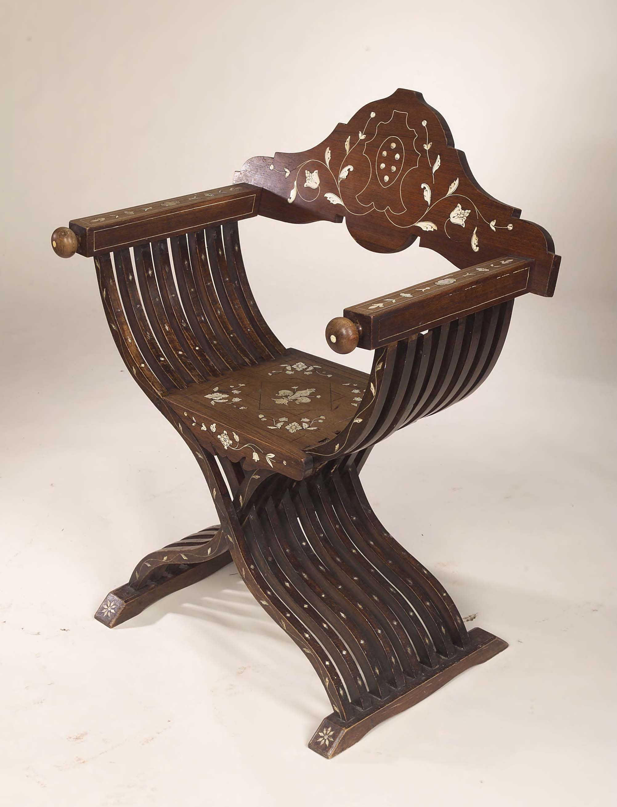 A Spanish 19th century rosewood travelling armchair,