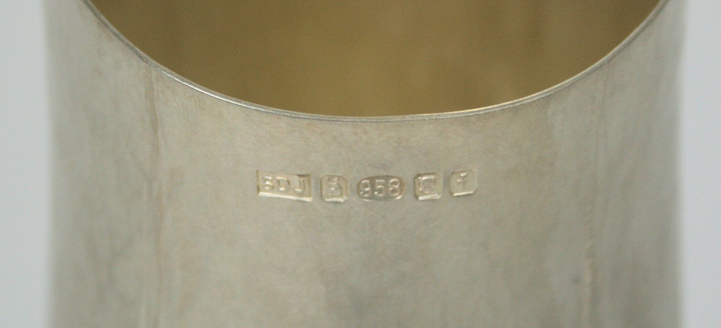 SIDSEL DORPH-JENSEN - A Brittania standard silver pouring vessel