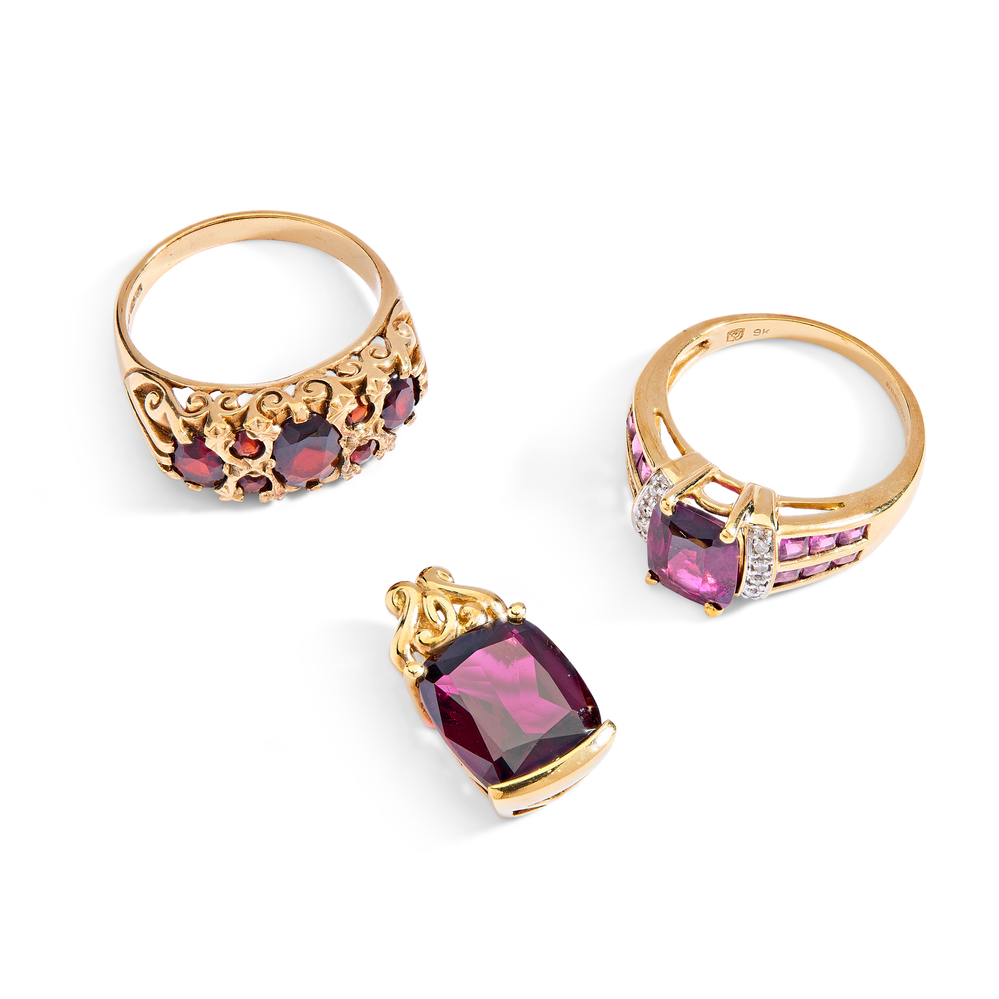 A collection of 9ct gold garnet and diamond jewellery