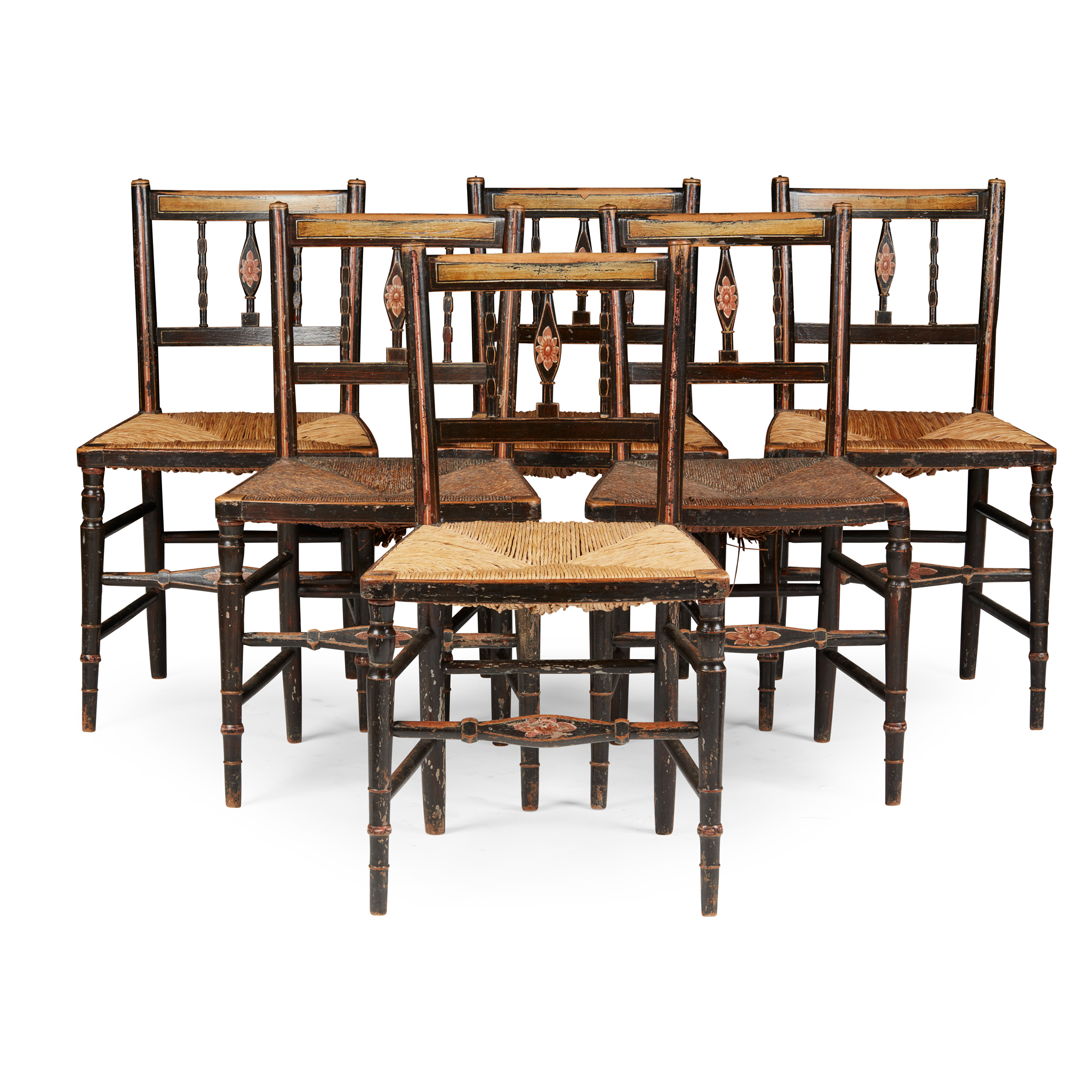 SET OF SEVEN GEORGE III EBONISED AND POLYCHROMED BEECH DINING CHAIRS