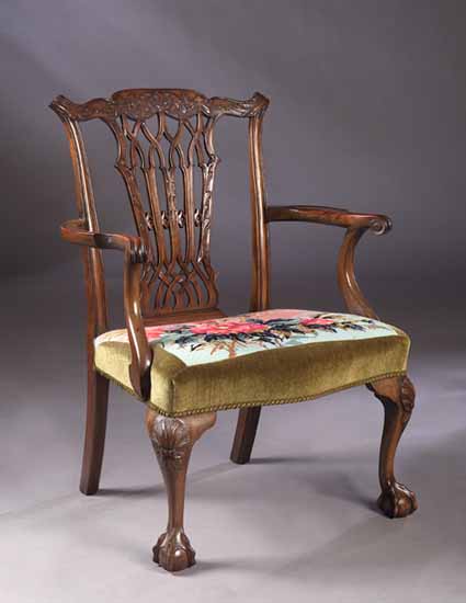 A George II style mahogany open armchair