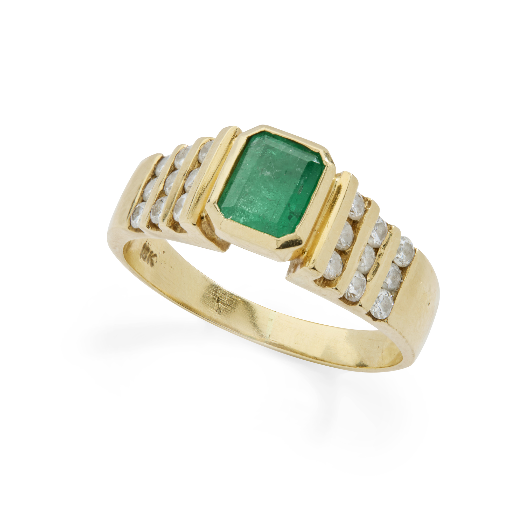 An emerald and diamond ring