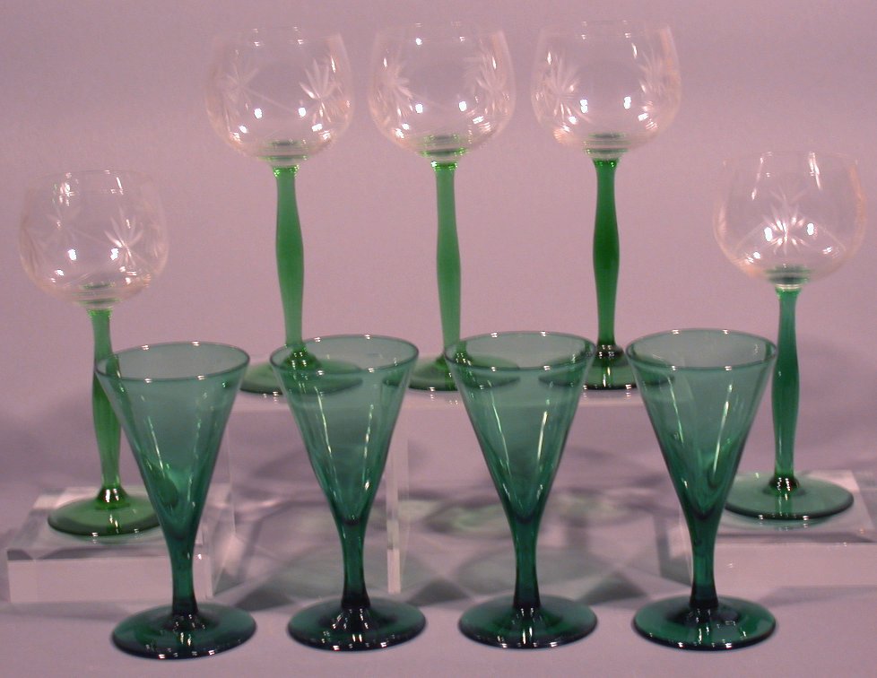 A set of ten coloured and cut wine glasses