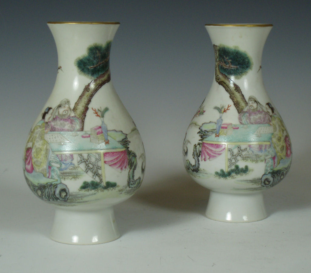A pair of Chinese famille rose vases Qianlong mark but later