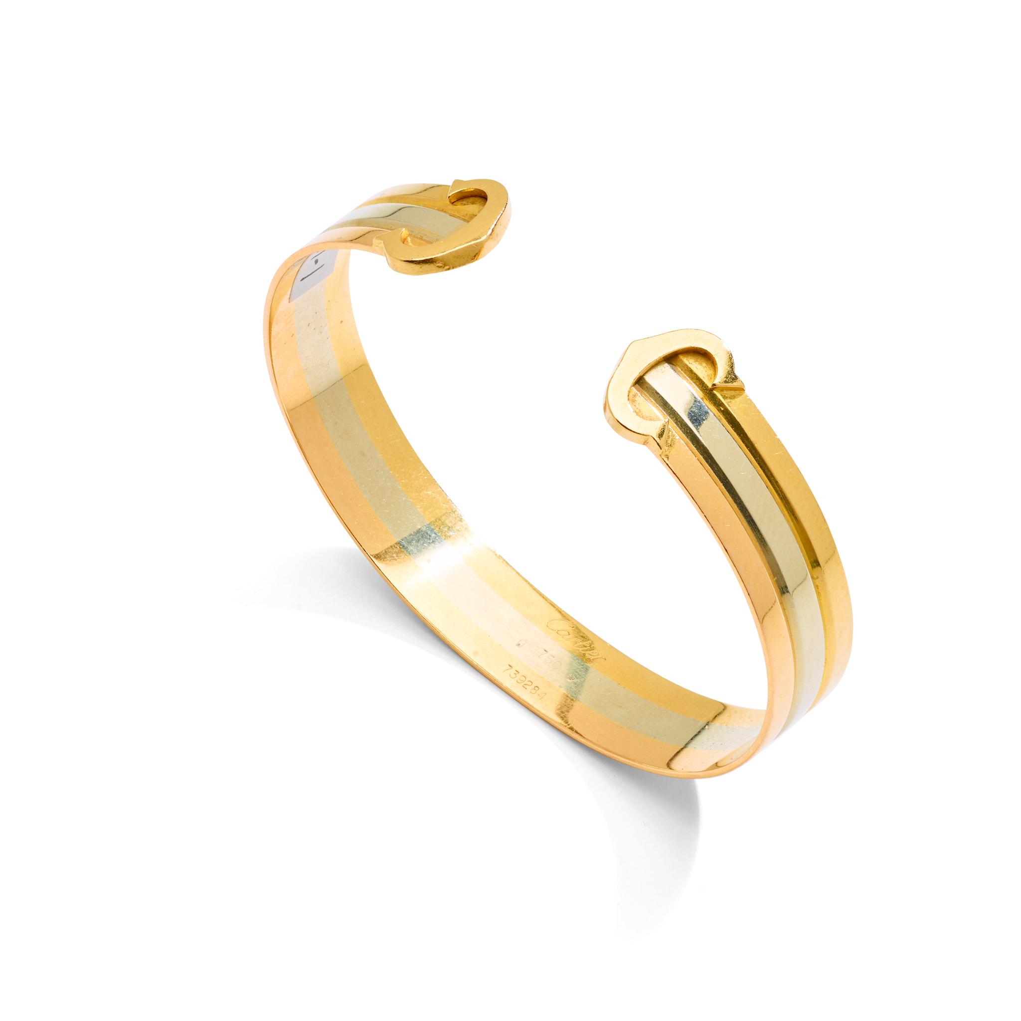 Cartier: A gold 'C de Cartier' cuff