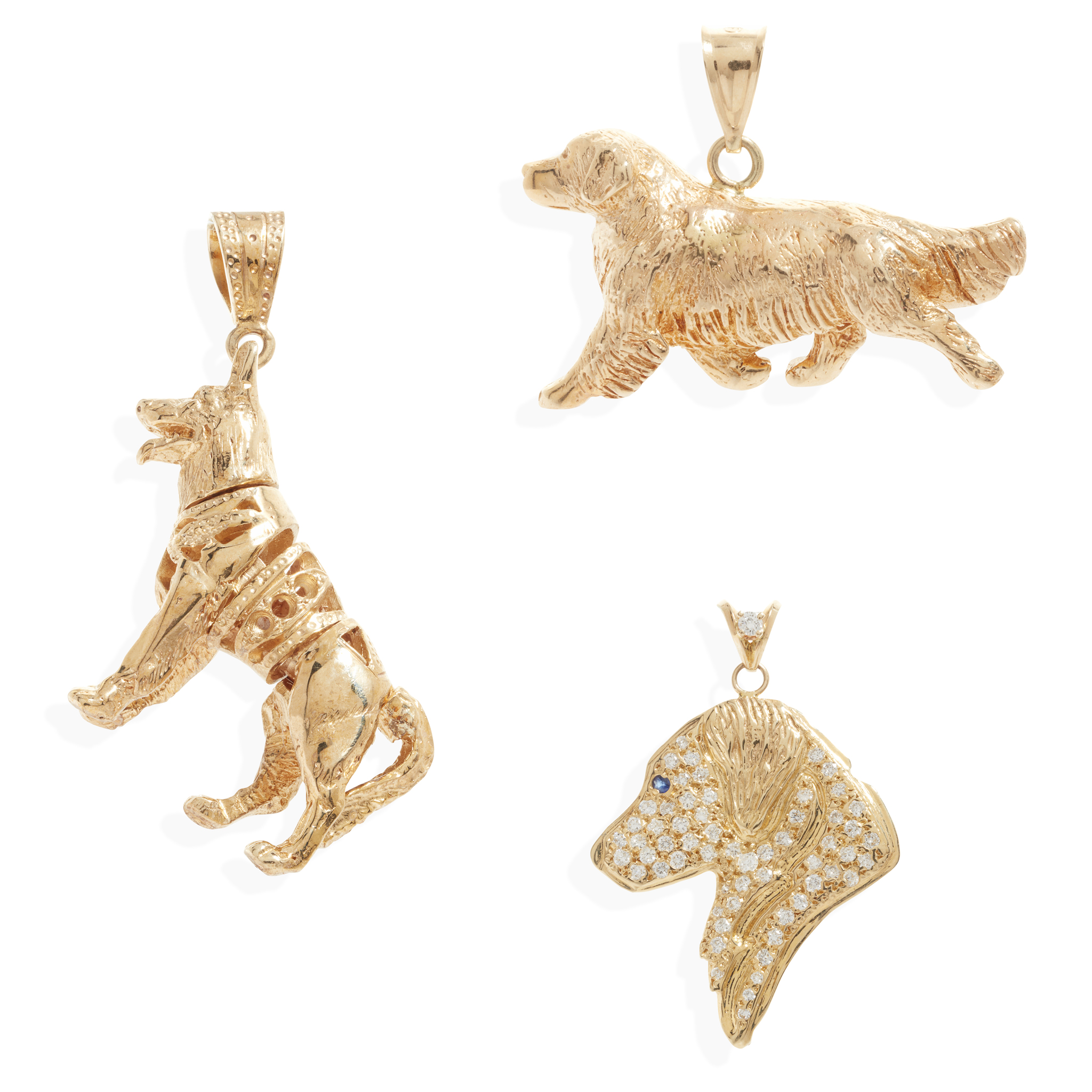 A collection of 'Dog' pendants