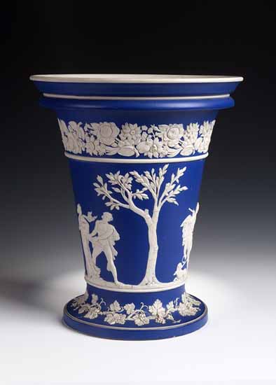 A pair of Le Nove white earthenware faience two handled oviform vases