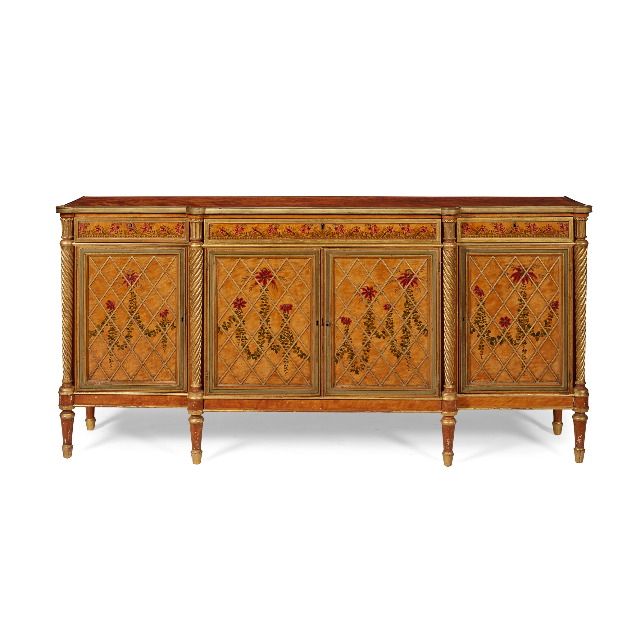 LATE GEORGE III SATINWOOD, TULIPWOOD, PAINTED AND PARCEL-GILT, BRASS MOUNTED BREAKFRONT SIDE CABINET