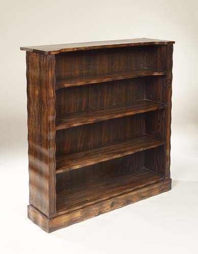 An early 19th century coromandel open bookcase,