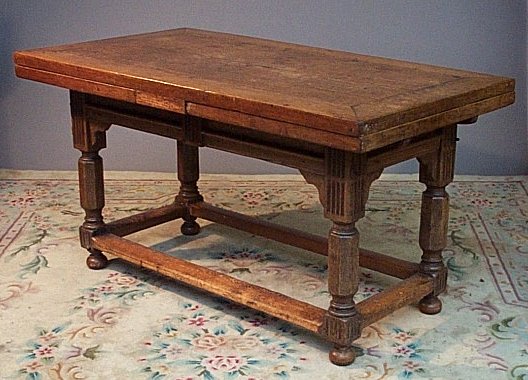 An oak draw leaf refectory table