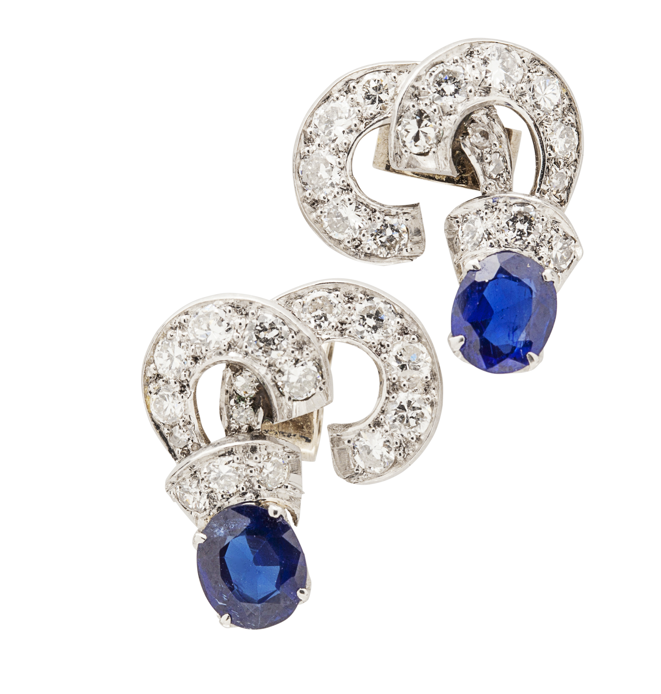 A pair of diamond and sapphire set earrings