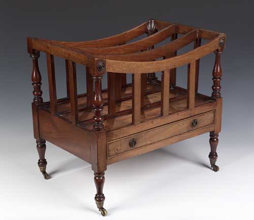 An early 19th century mahogany Canterbury