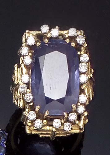 A mid 20th century 18ct gold and platinum mounted sapphire and diamond ring,