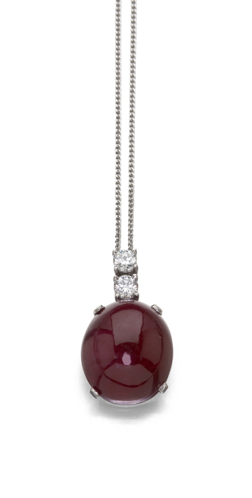 An 18ct white gold mounted ruby and diamond set pendant,