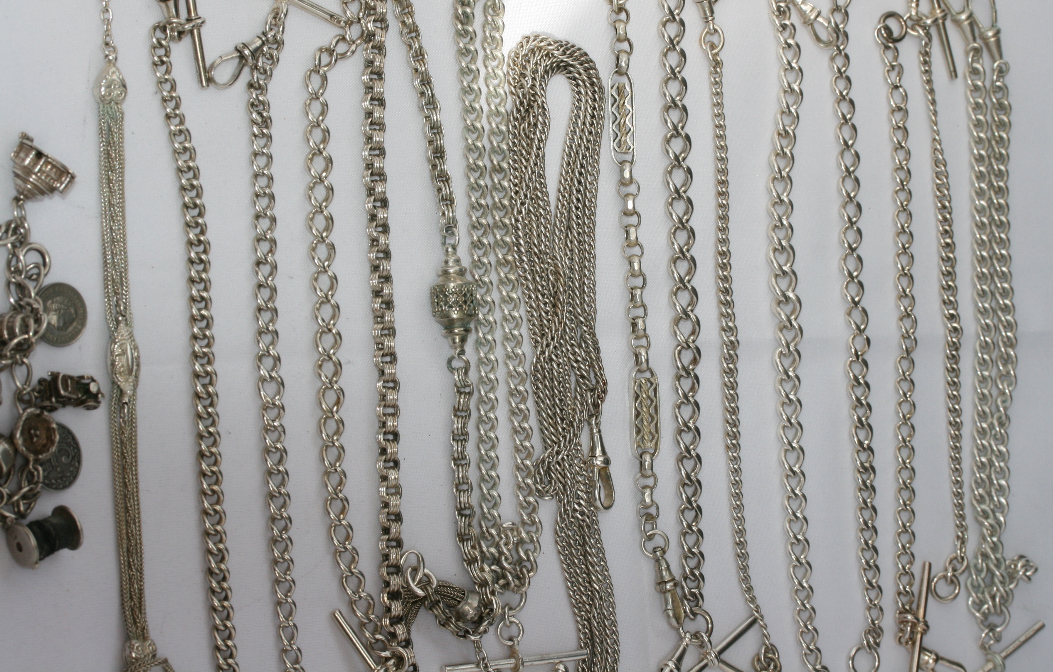 A large collection silver watch chains
