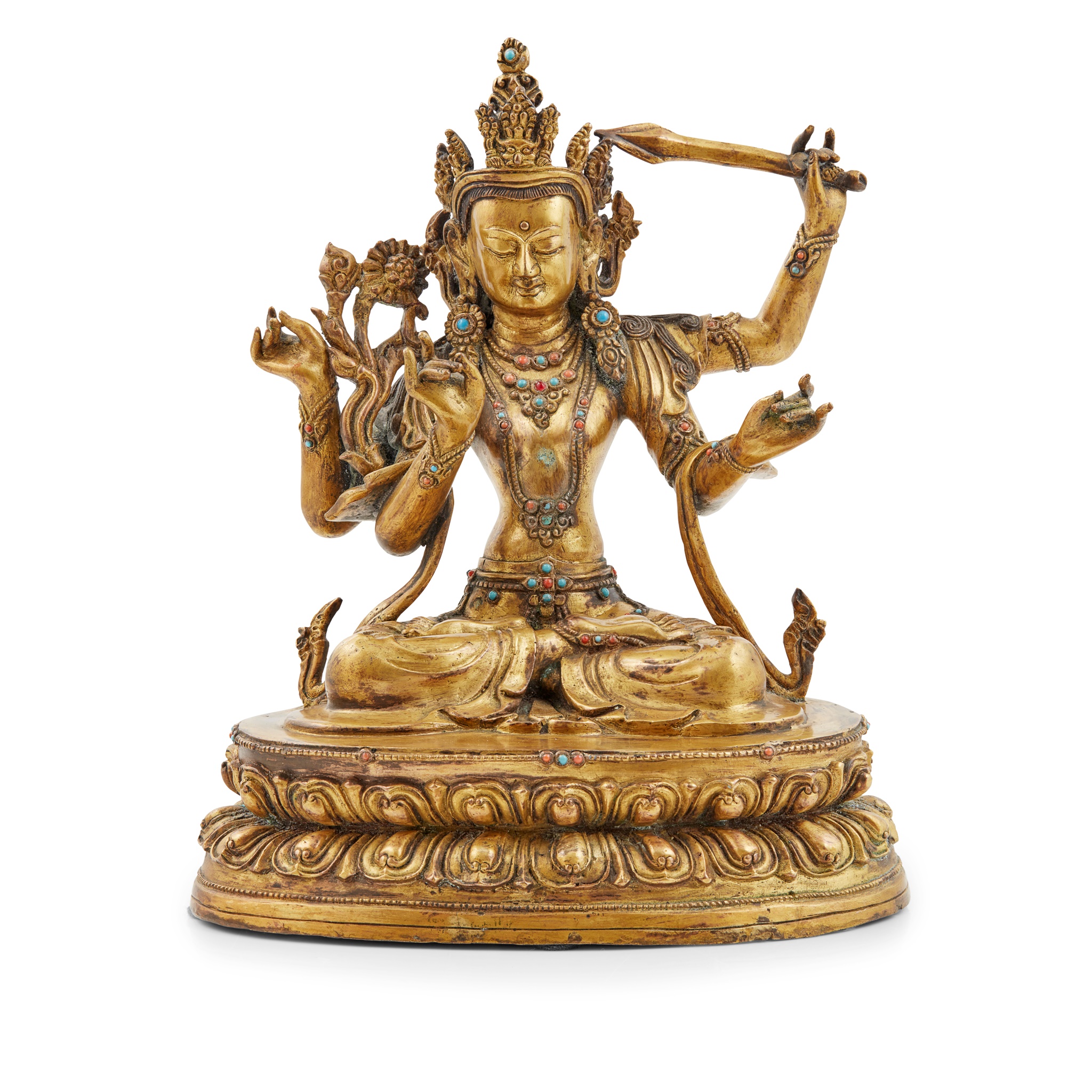 GILT-BRONZE FIGURE OF FOUR-ARMED MANJUSRI
