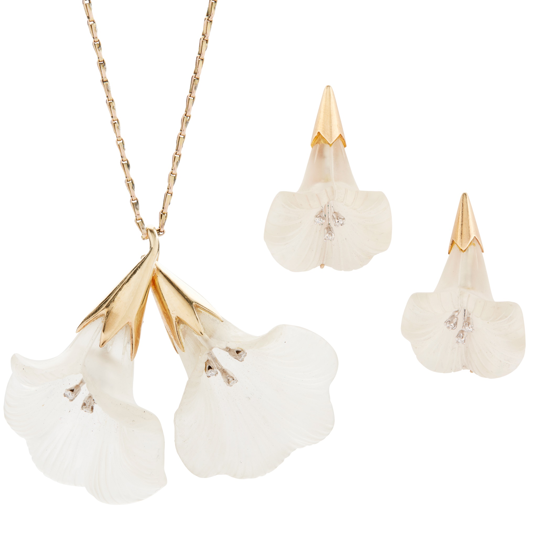 A rock crystal and diamond floral pendant and earrings