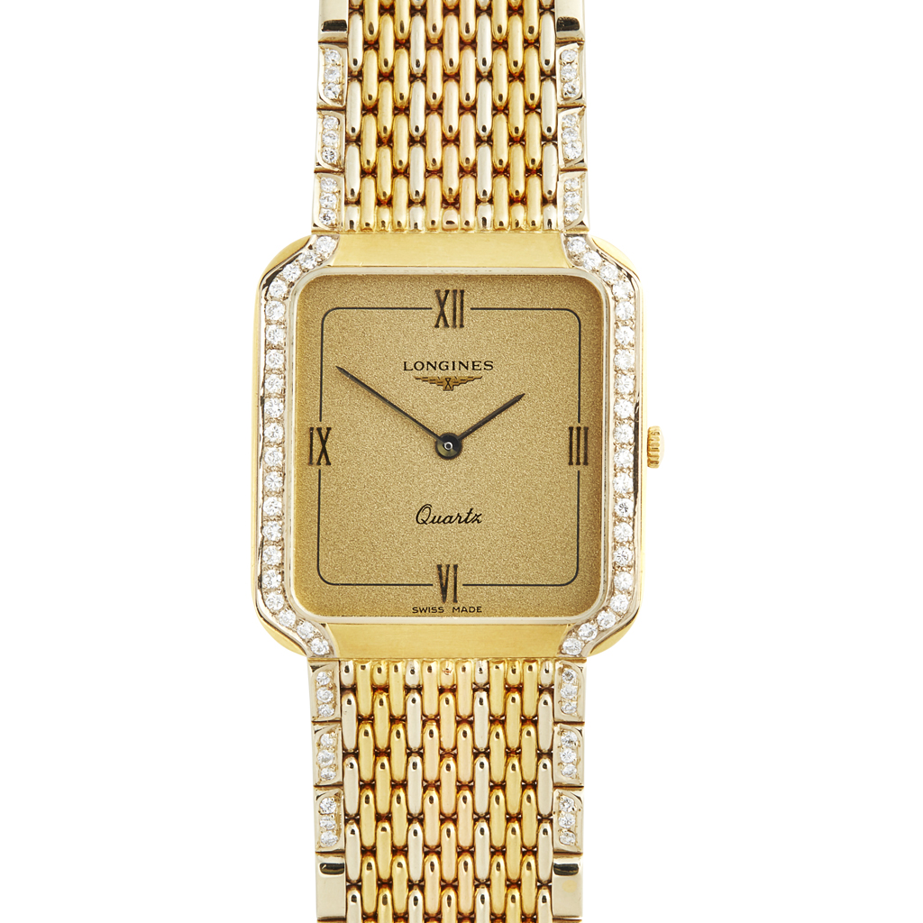 LONGINES - An 18ct gold and diamond set dress wrist watch