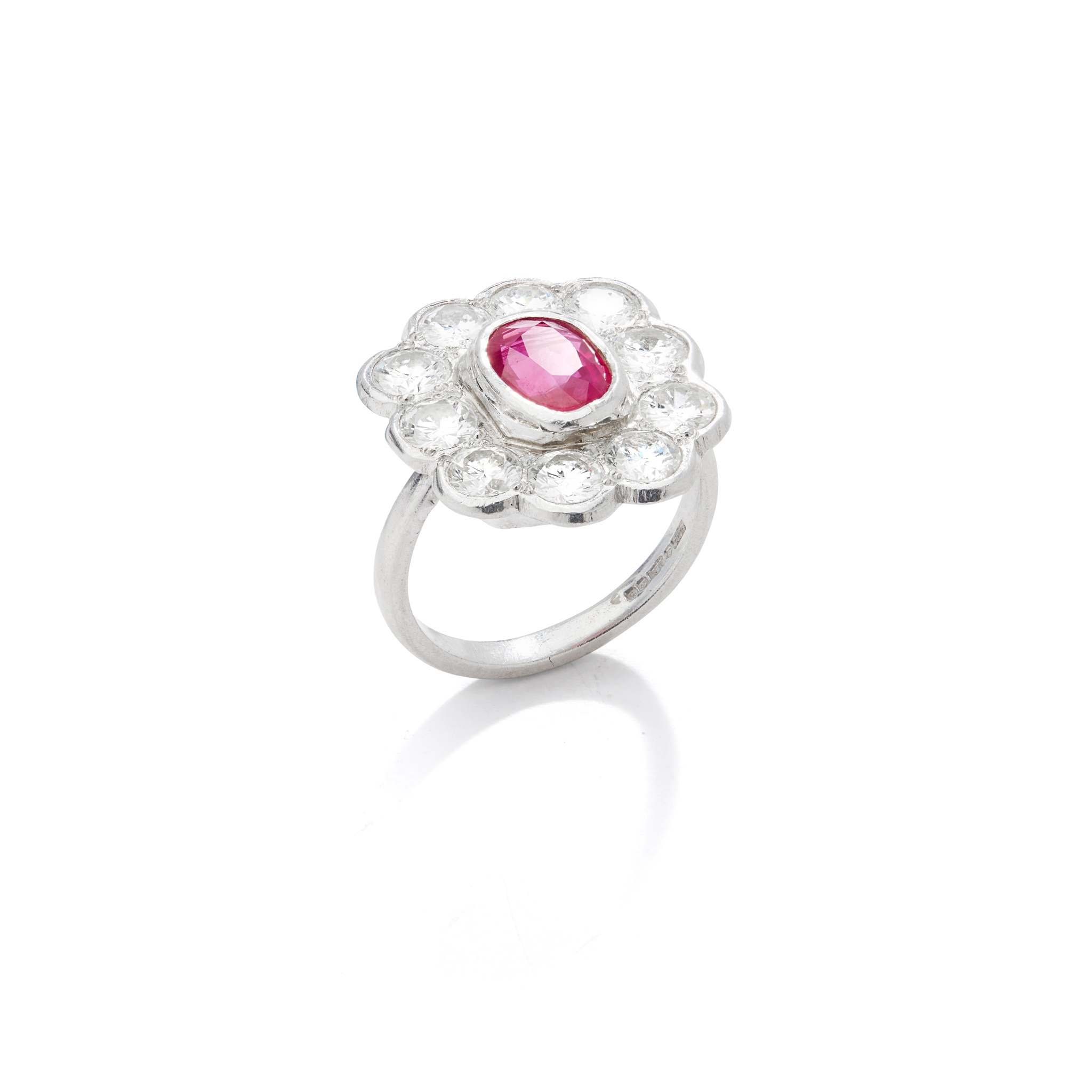 A ruby and diamond cluster ring