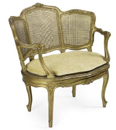 A pair of French giltwood fauteuils a canne, circa 1900