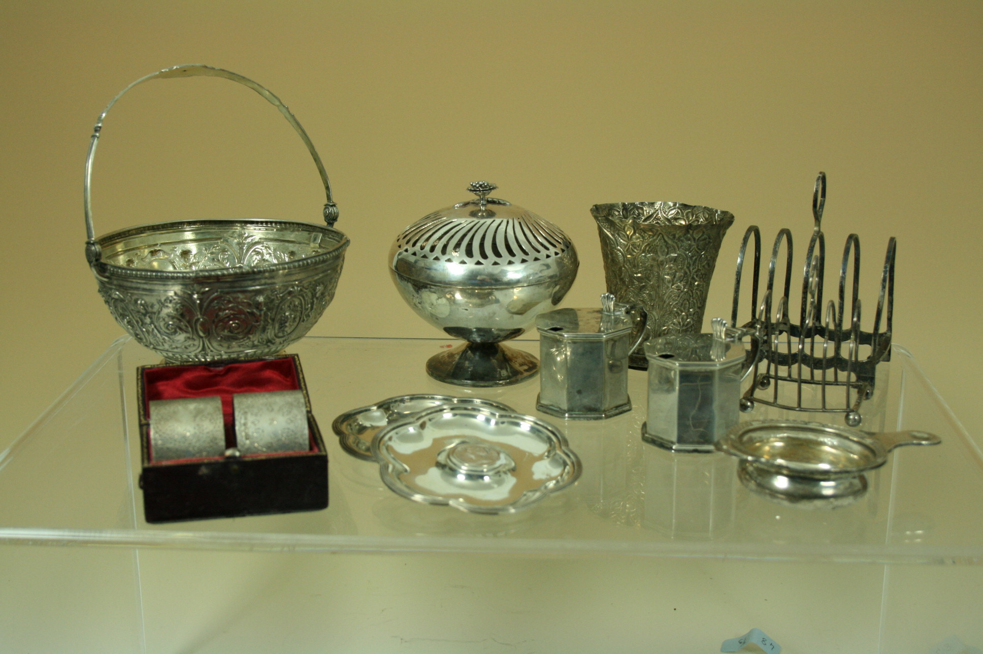 A pair of silver pin trays