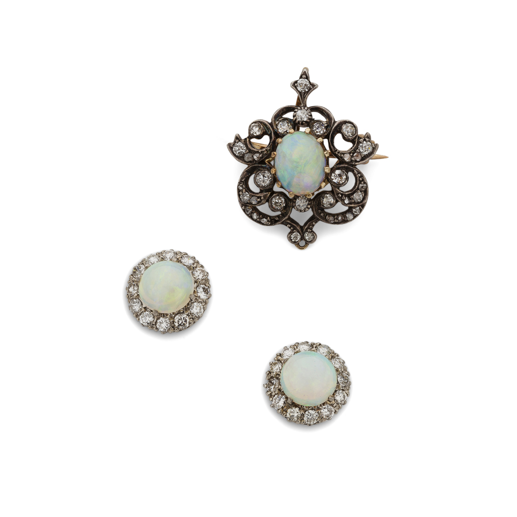 A pair of opal and diamond set pendant earrings