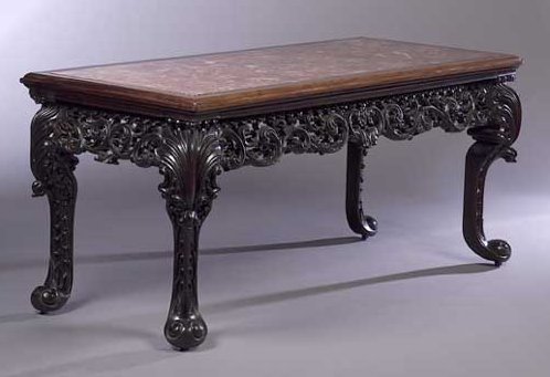 An Anglo-Indian carved hardwood side table