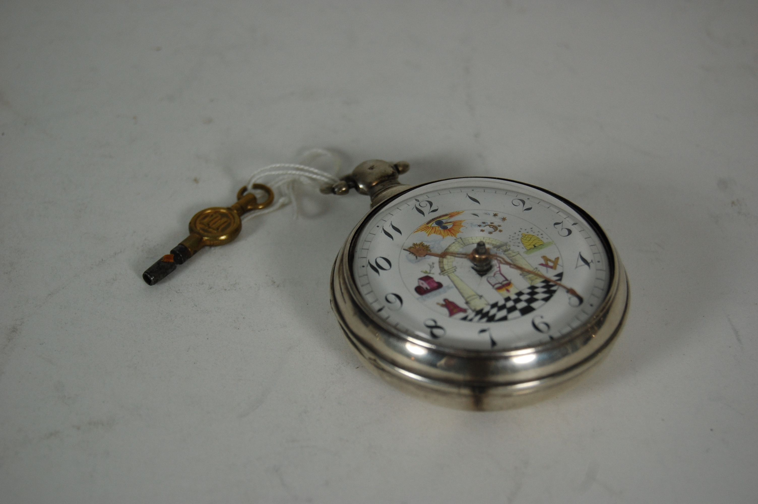 A George III masonic pair cased pocket watch
