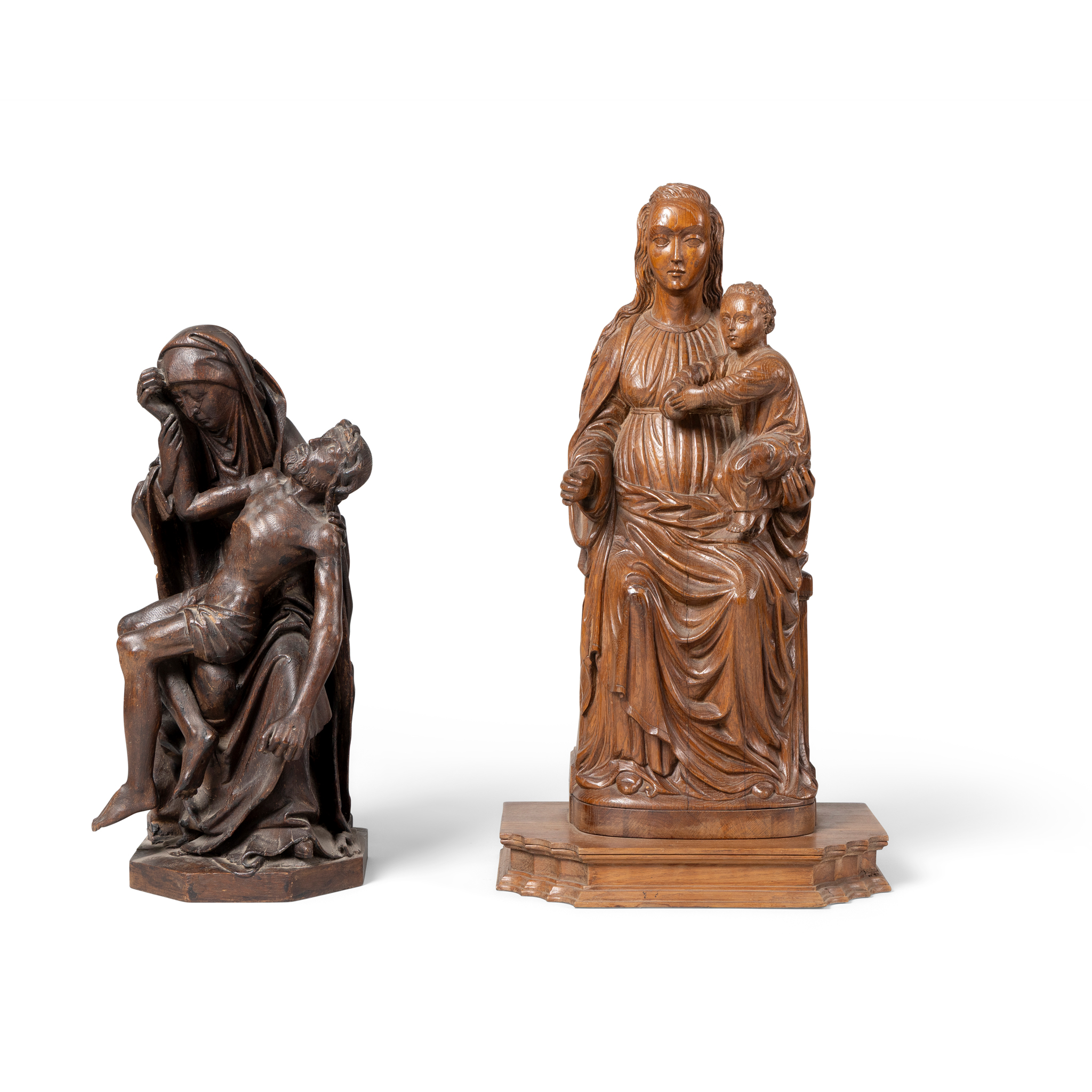TWO CARVED OAK FIGURE GROUPS