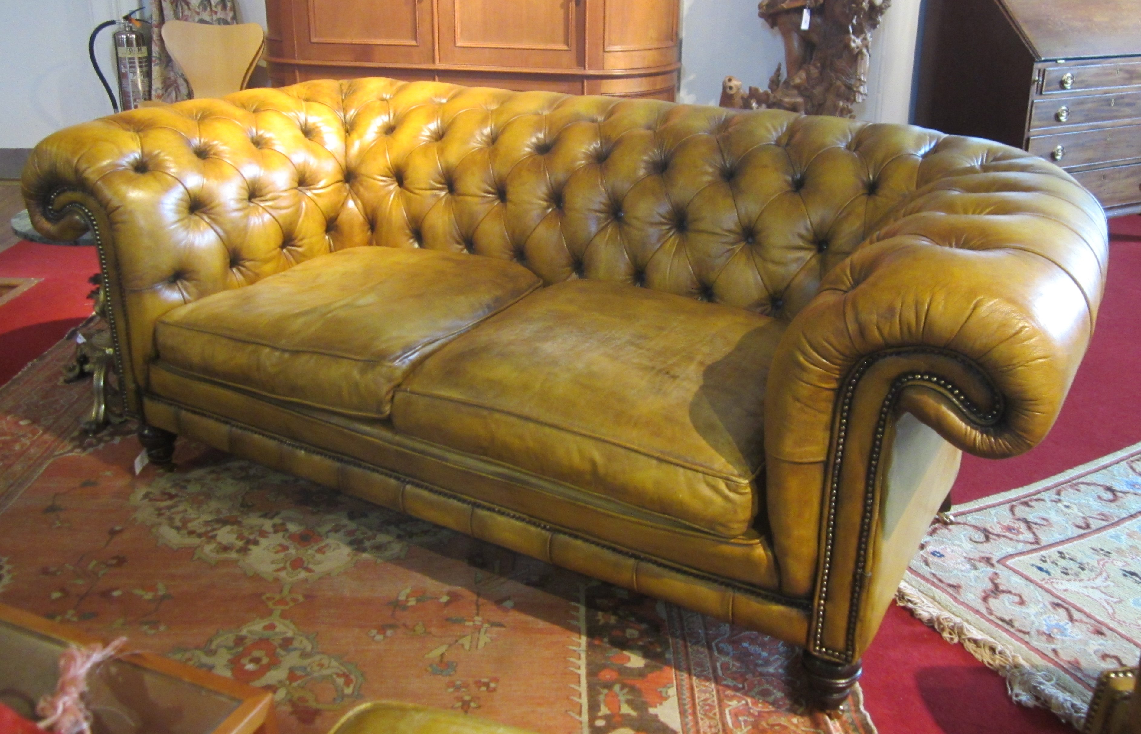 TWO SEATER LEATHER CHESTERFIELD SOFA
