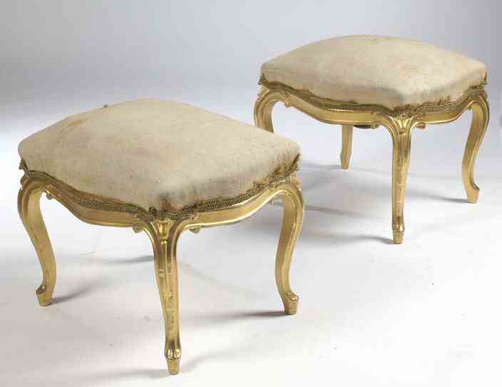 A pair of giltwood centre stools In the Louis XV manner