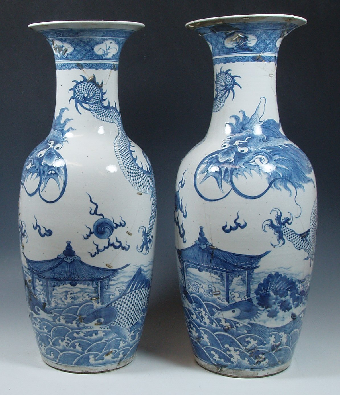 A pair of late 18th century Chinese blue and white baluster vases,