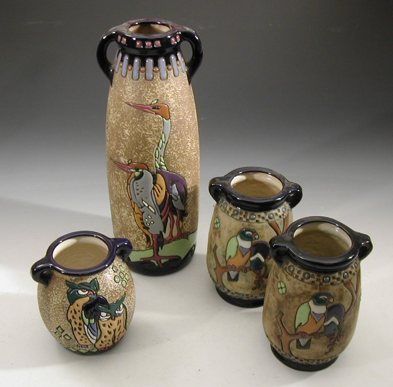 An Amphora twin handled cylindrical vase,