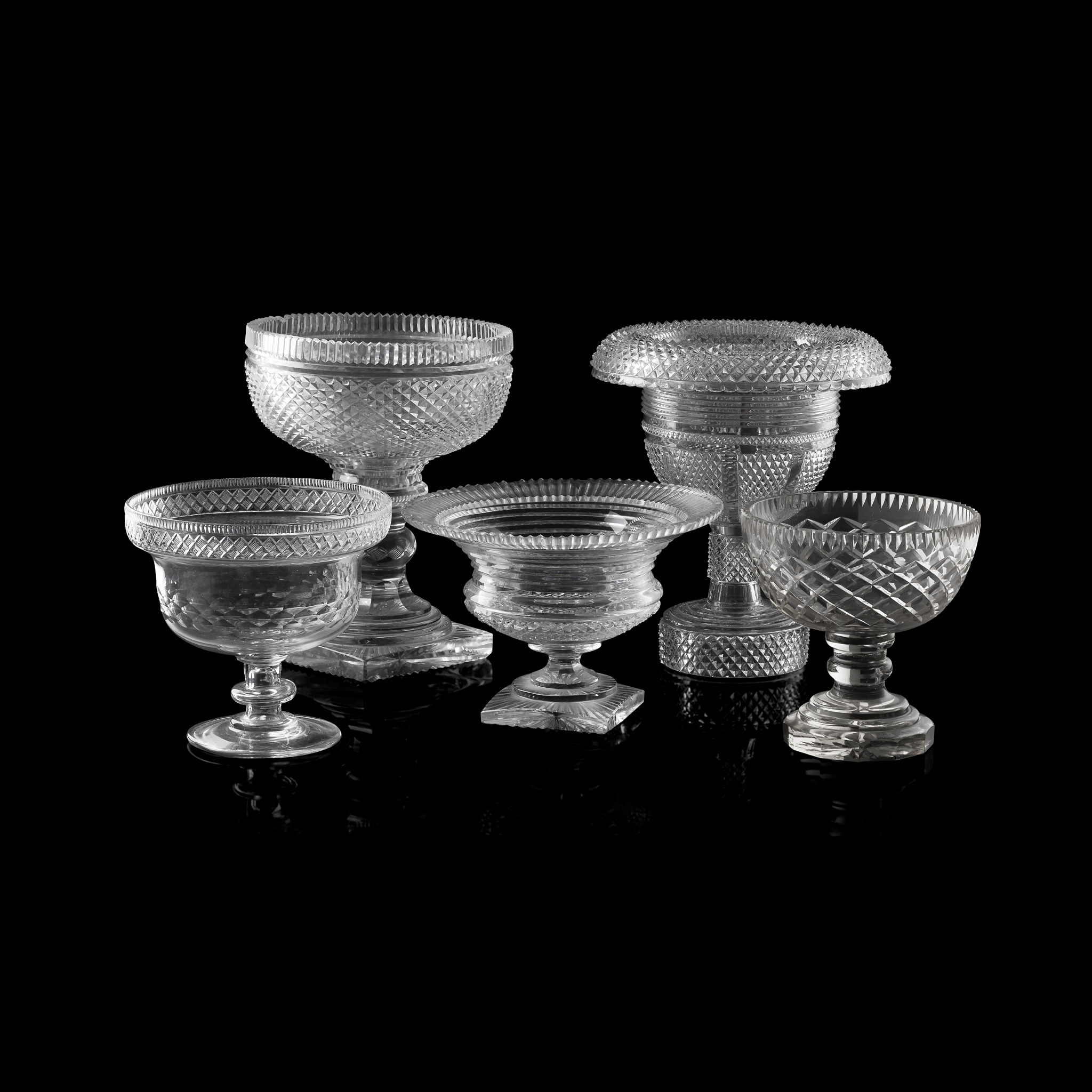 FIVE REGENCY CUT GLASS FOOTED COMPORTS