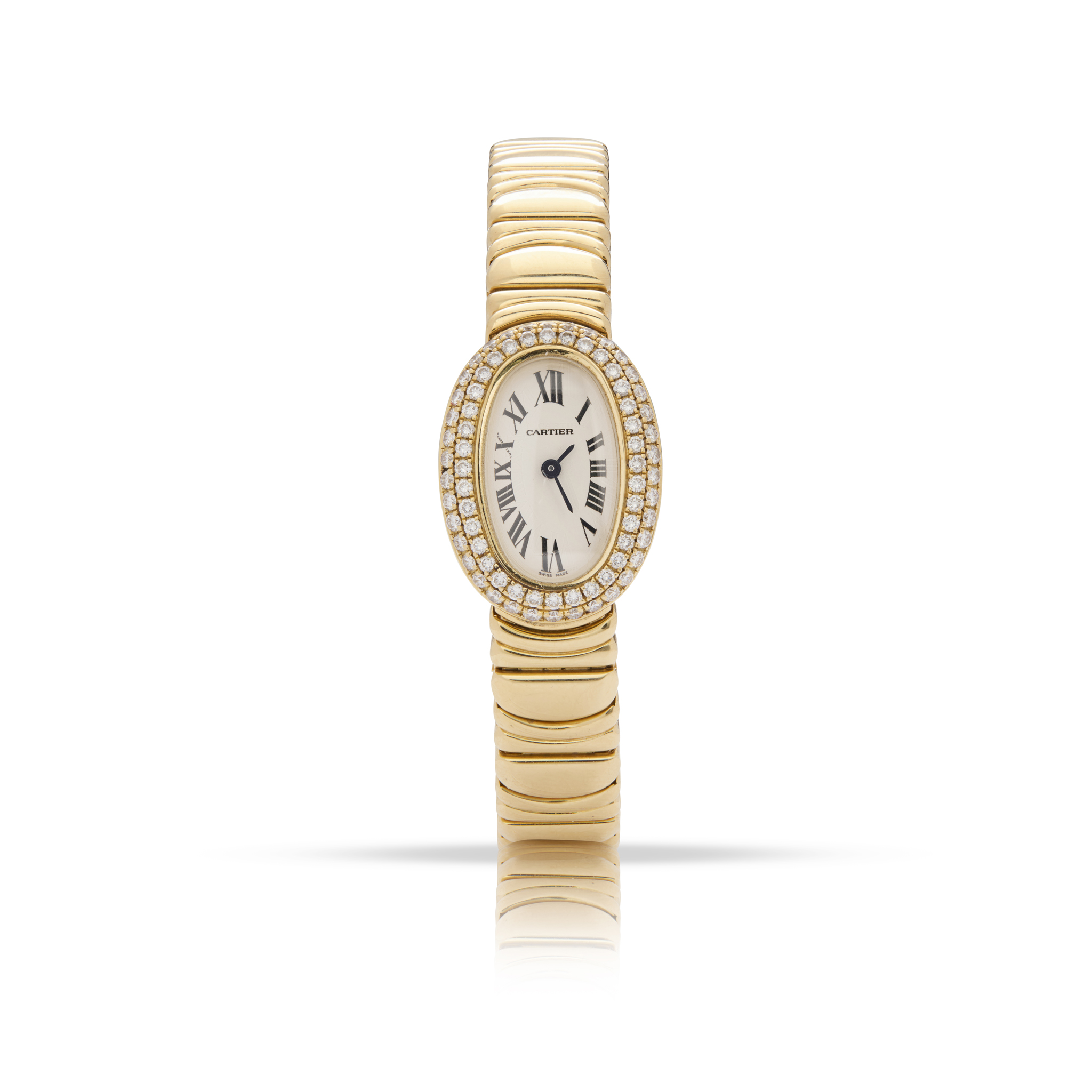 Cartier. A ladies very fine 18k yellow gold and diamond quartz oval bracelet watch