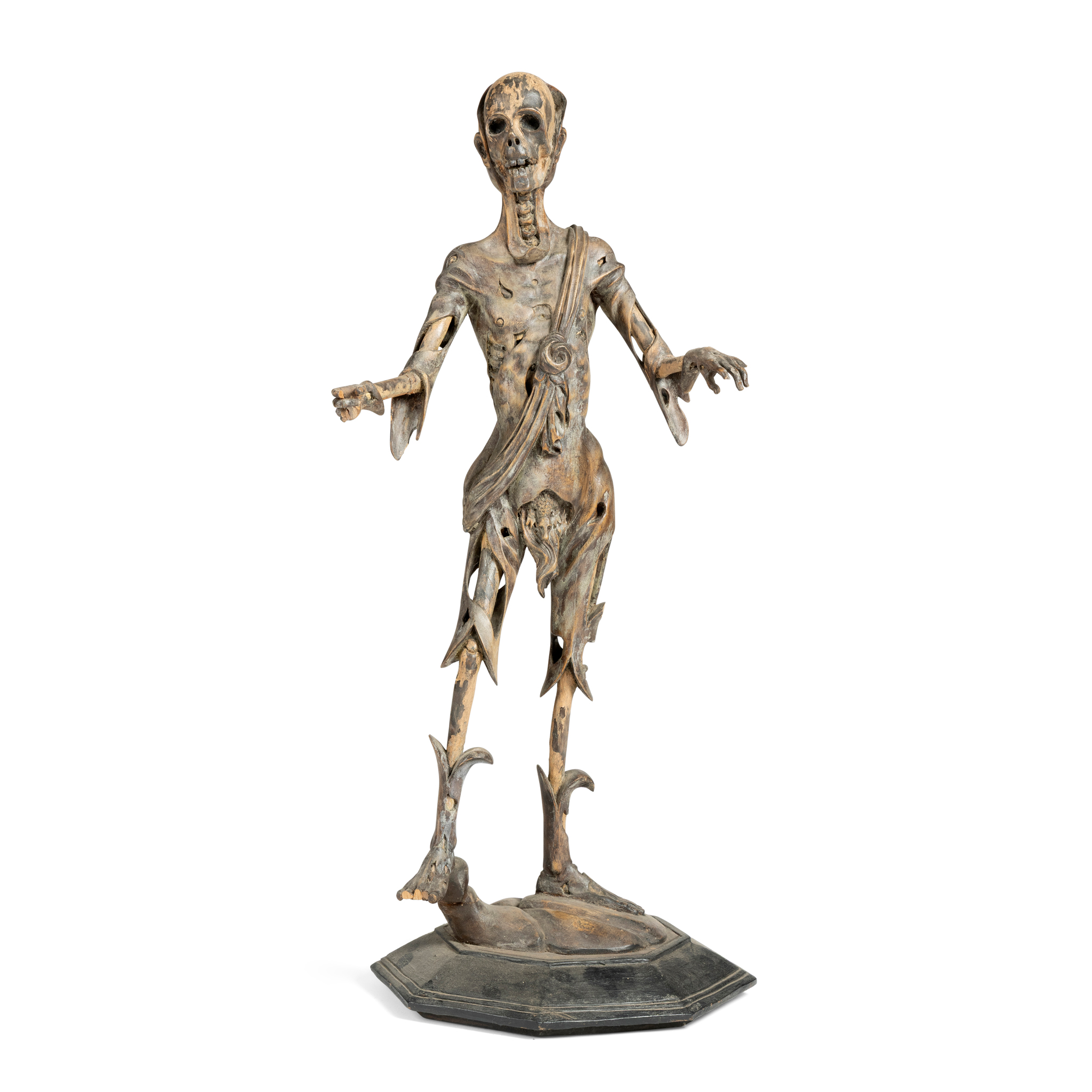 A CONTINENTAL FRUITWOOD MOMENTO MORI CARVING
