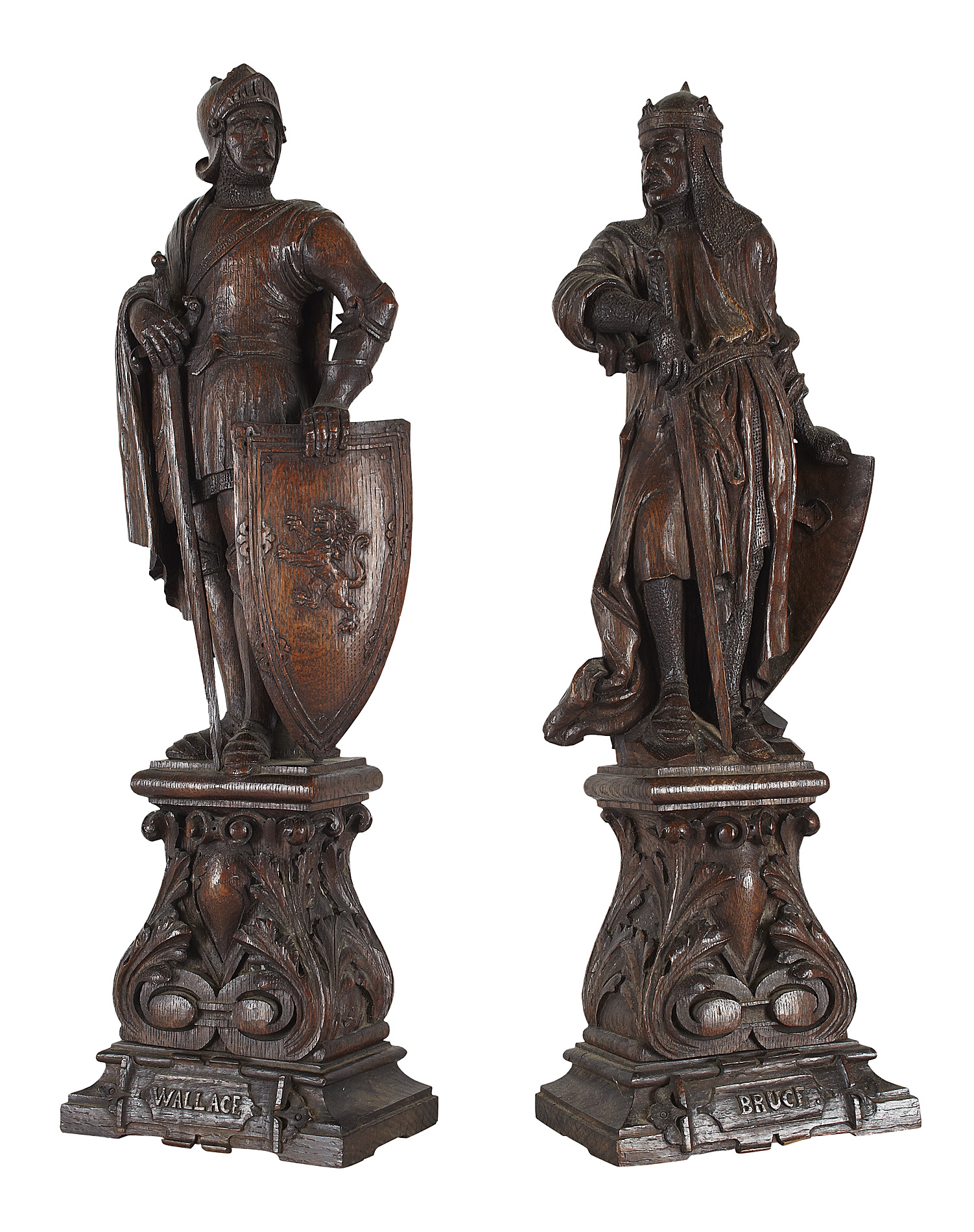 PAIR OF SCOTTISH CARVED OAK FIGURES OF WILLIAM WALLACE AND ROBERT BRUCE