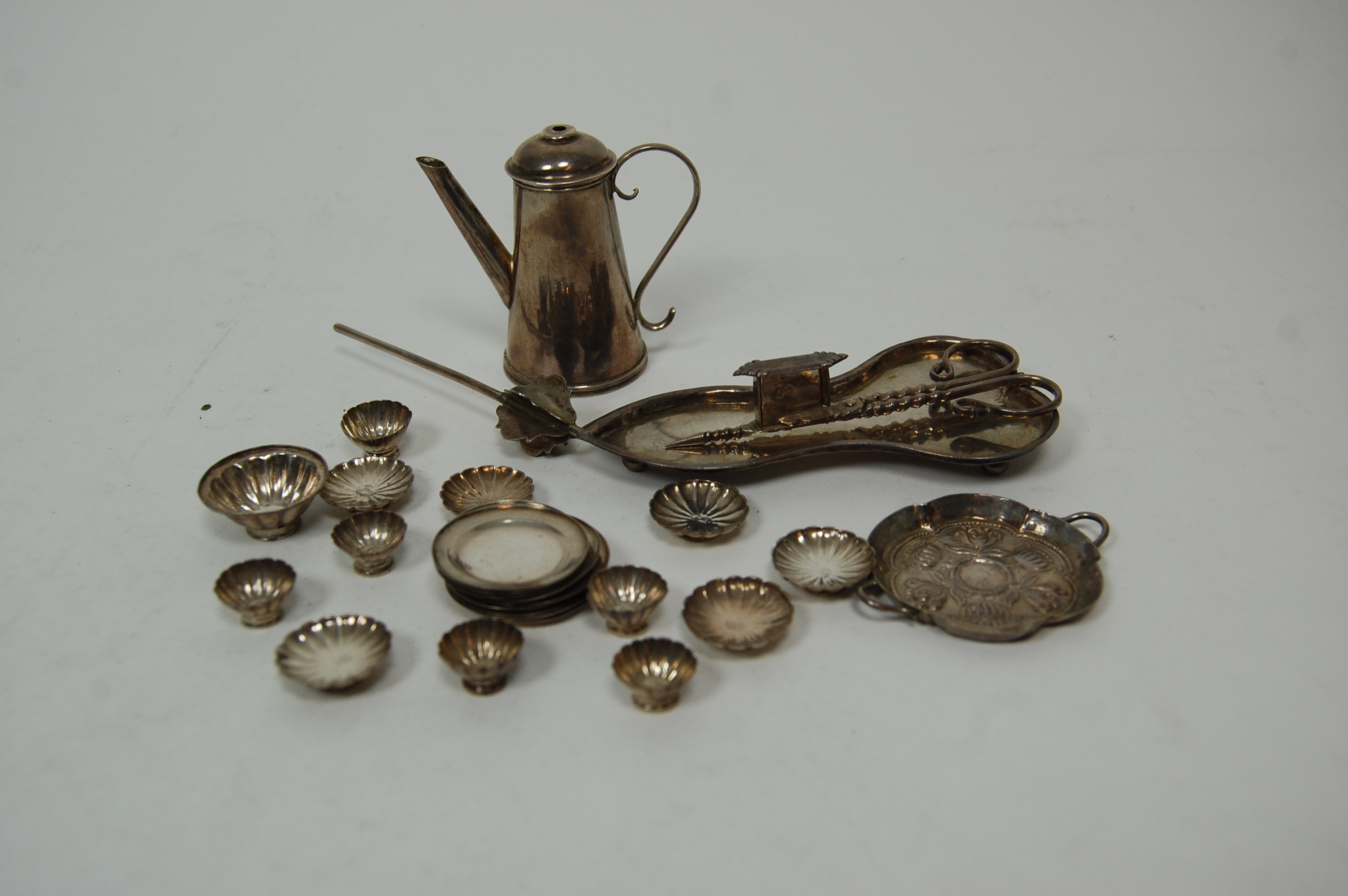 A collection of miniature silver