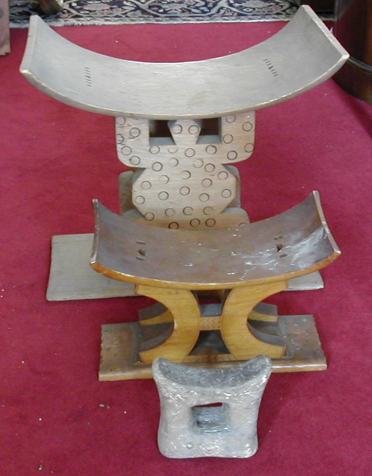 An African carved stool,
