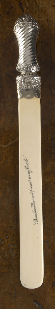 A Victorian silver mounted ivory page turner