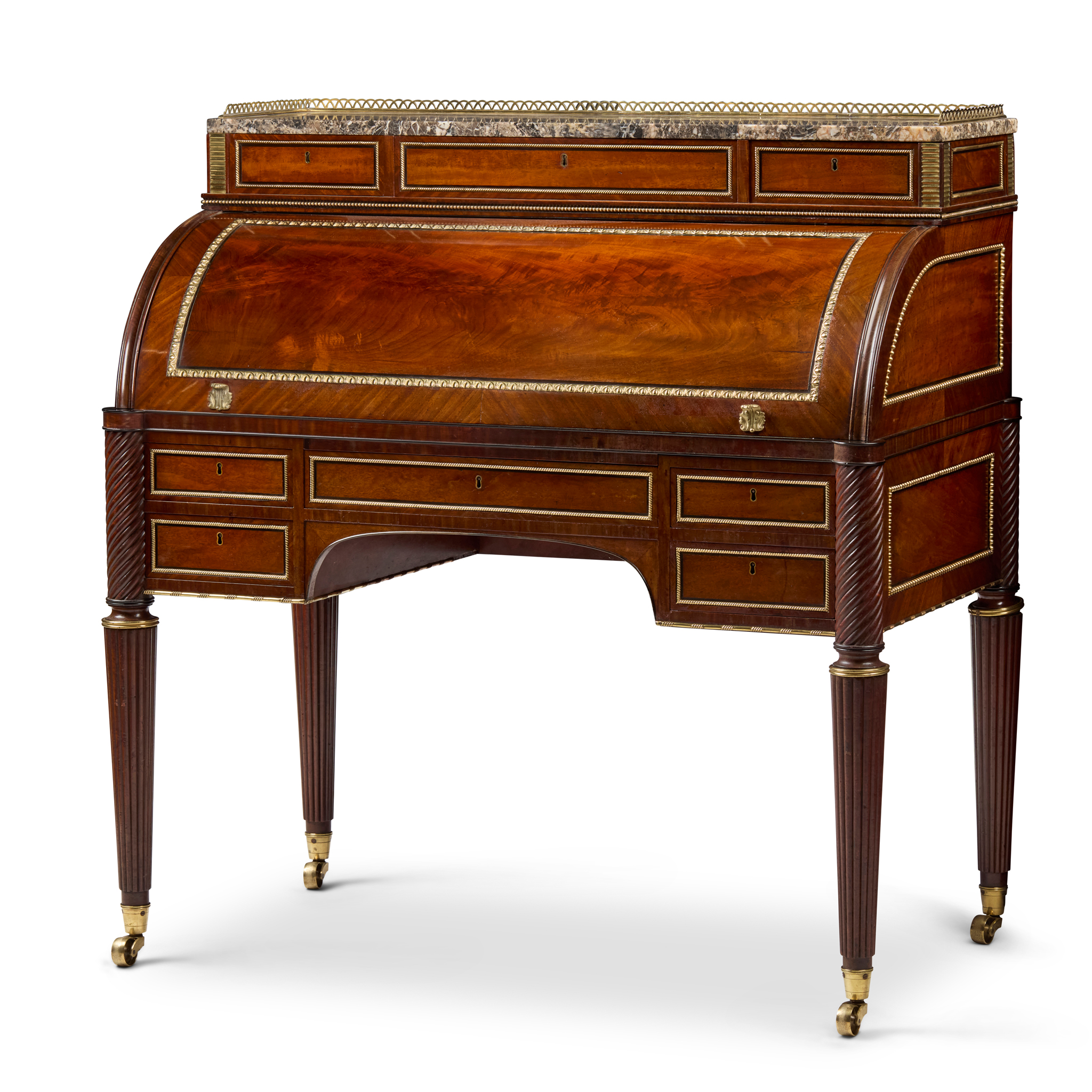 REGENCY MAHOGANY, EBONY, BRASS AND PORTORO MARBLE MOUNTED CYLINDER DESK, IN THE MANNER OF JOHN MCLEAN