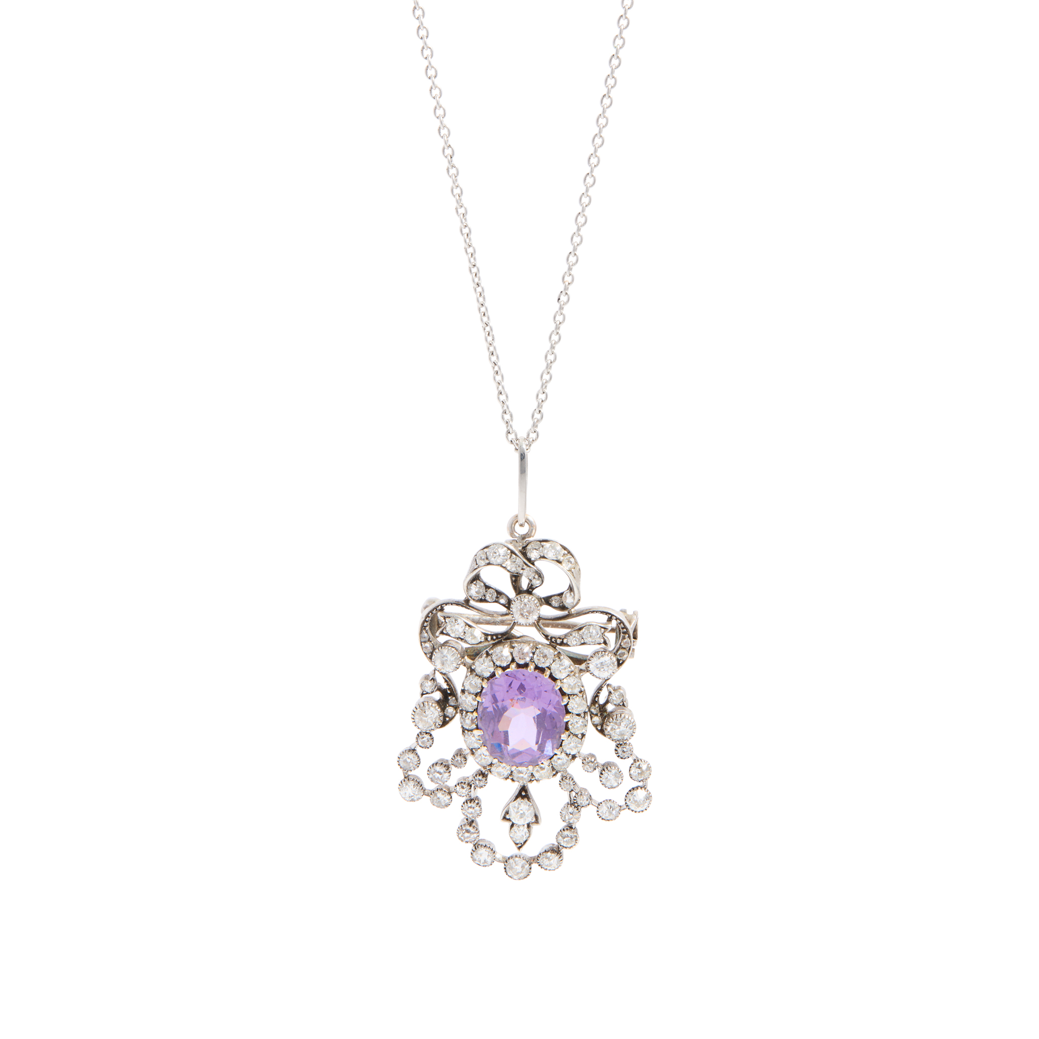 An early 20th century purple spinel and diamond pendant necklace