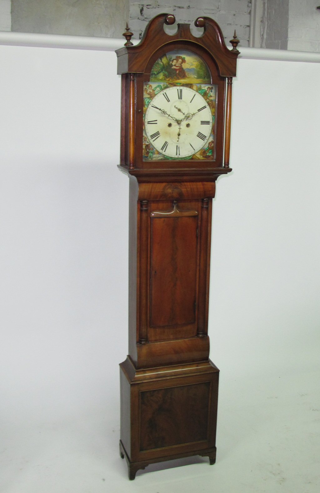 A late Victorian mahogany longcase clock