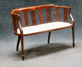 A Victorian mahogany parlour sofa