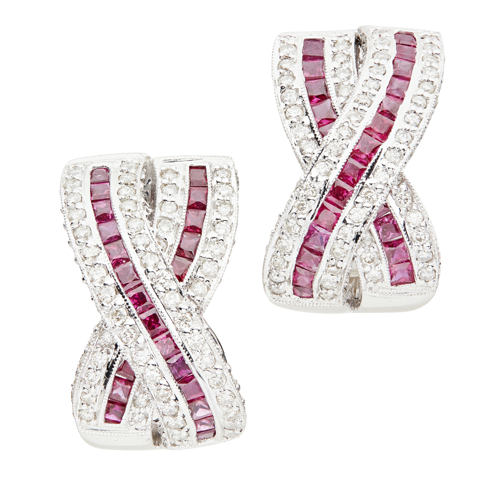 A pair of ruby and diamond set earrings