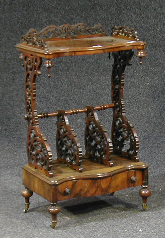 A Victorian walnut whatnot canterbury,