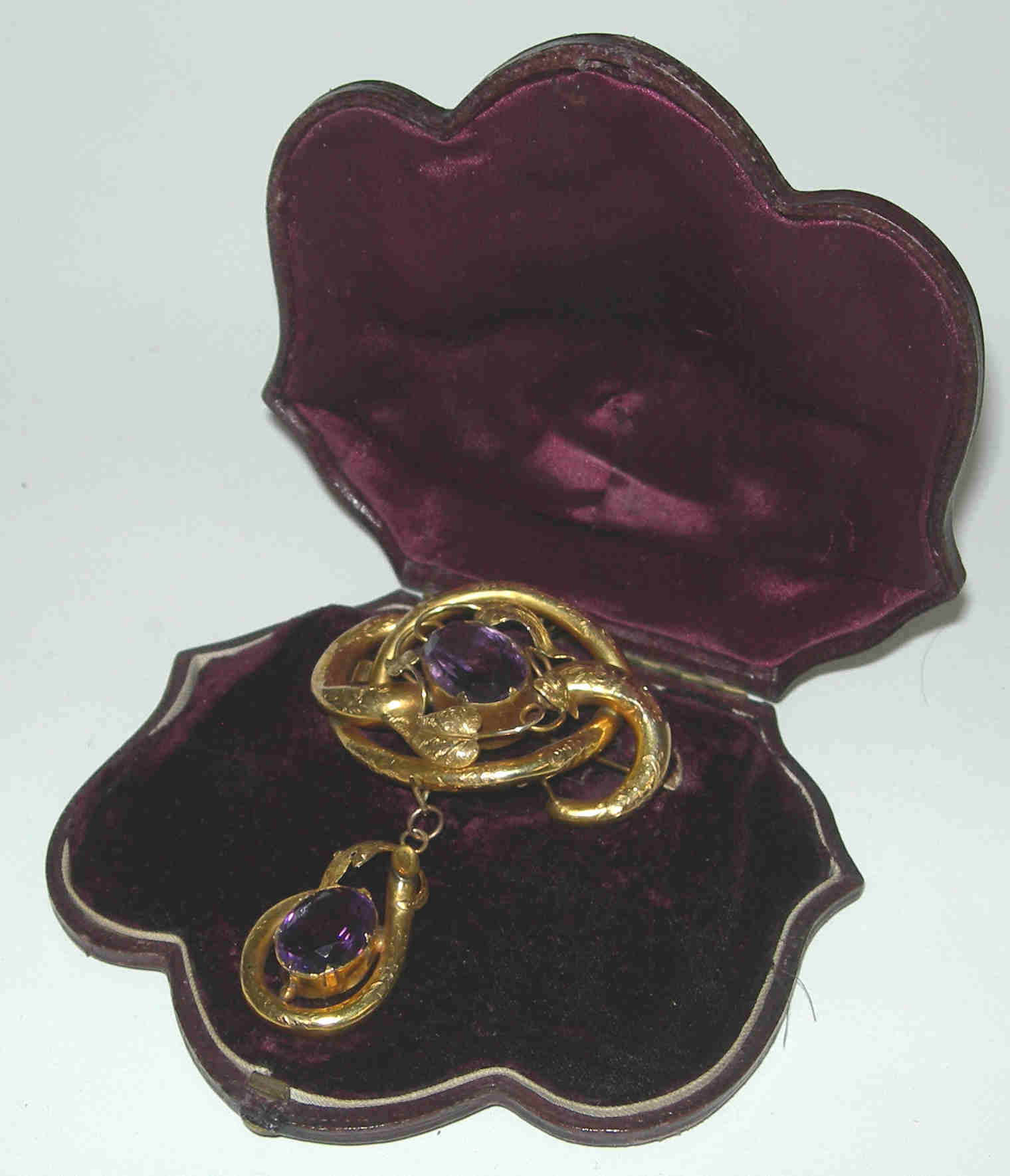 A Victorian gold mounted amethyst set brooch,