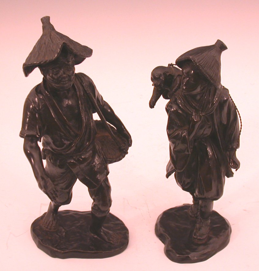 A pair of Japanese bronze figures, Meiji period,