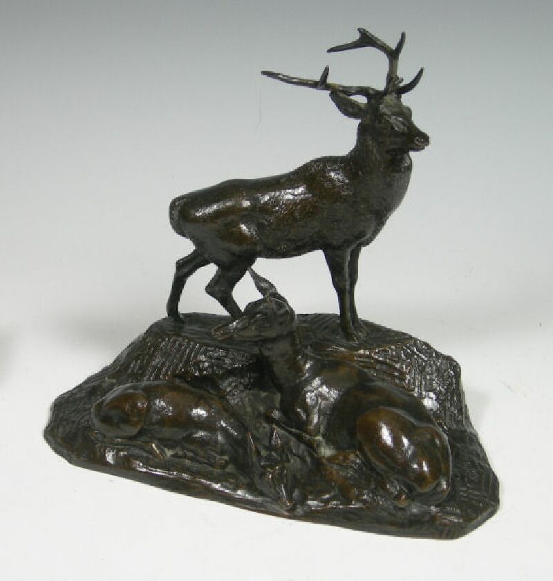 A bronze of stag and does after Barye